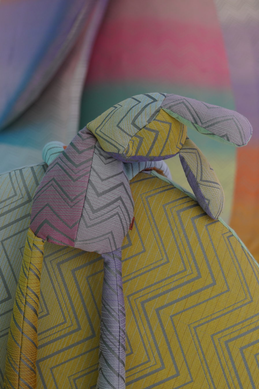The fabric is highlighted by piled, stacked zigzag lines, amazing rainbow color combinations, and sunset splashes that take you into a lovely fantasy.